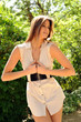 Beautiful model posing outdoors in a park