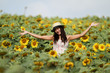 fun woman in the field of sunflowers fun woman in the field of sunflowers