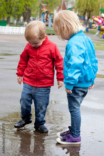 Photo: Boy with girl are walking on the street Boy with girl are walking on the street