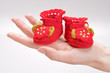 crocheted booties for a girl in the woman hand crocheted booties for a girl in the woman hand