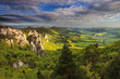 Summer landscape in mountains and the dark blue sky with clouds.