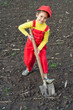 Little girl with big shovel