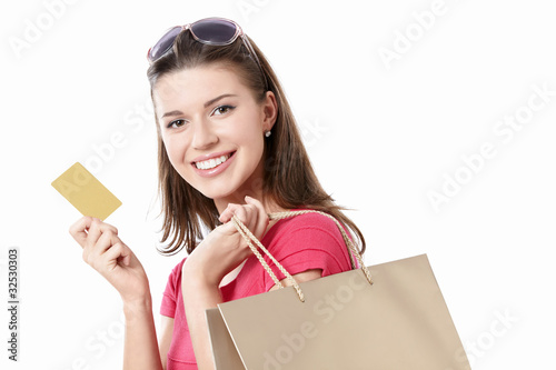 Photo: Young girl with a credit card Young girl with a credit card