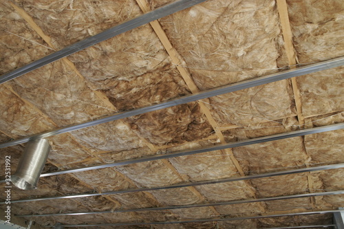 Photo: detail of roof insulation in a new house detail of roof insulation in a new house