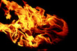 Photo: Bright red yellow fire on black background Bright red yellow fire on black background