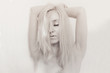 young woman with closed eyes