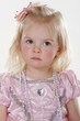 portrait of litle girl with pouting facial expression