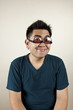 Funny face, A man wear eyeglass upside down smile. Funny face, A man wear eyeglass upside down smile.