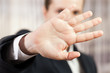 Hand hiding face