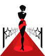 Woman silhouette on a red carpet Woman silhouette on a red carpet