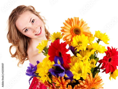 Photo: Young woman holding flowers. Young woman holding flowers.