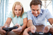 Mature couple playing video game
