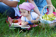 Young family of three on a picnic
