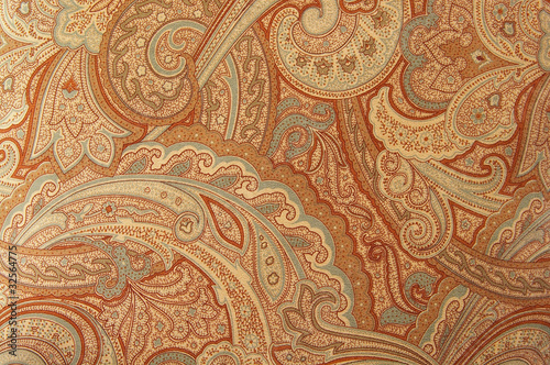Photo: A brown paisley 70s style design pattern A brown paisley 70s style design pattern