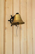 Dinner Bell on panel wall