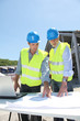 Industrial people working on building site Industrial people working on building site