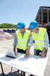 Industrial people working on building site Industrial people working on building site