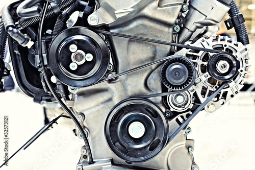 Photo: pulleys with belt in the car motor pulleys with belt in the car motor