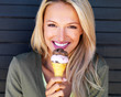 Attractive young girl with an ice cream