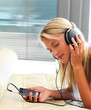 Beautiful woman listening romantic music