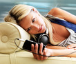 Pretty woman taking a break from listening to music