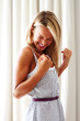 Excited young woman celebrating success