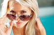Pretty young female looking through googles