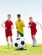 Closeup of a football with blurred opponents in the background