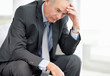 Stressed business man thinking about something