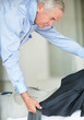 Senior business man getting ready for office