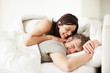 Photo: Happy mature couple lying in bed Happy mature couple lying in bed
