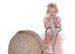 Photo: pretty little girl with security blanket and baby carriage pretty little girl with security blanket and baby carriage