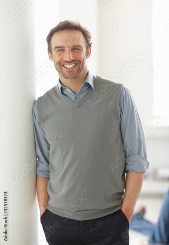 Photo: Smart middle aged man with his hands in pockets Smart middle aged man with his hands in pockets
