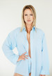 Sexy young female wearing a blue shirt