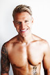 Young muscular guy smiling