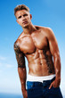 Smart guy with a muscular body