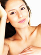 Naked young woman against white background