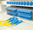 shot of network cables and servers in a technology data center