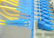 shot of network cables and servers in a technology data center