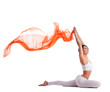 woman in yoga pigeon pose and orange flying fabric