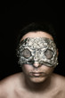 Freak in foil mask and reticulated facet eye covers on black
