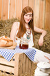 Redhead hippie woman have breakfast in barn Redhead hippie woman have breakfast in barn