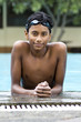 Portrait of a young male swimmer with a smile.