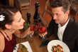 Photo: romantic dinner for two - couple in a restaurant romantic dinner for two - couple in a restaurant