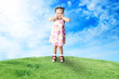 The happy child playing a glade