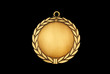 Gold medal isolated on black