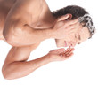 Young man wash face