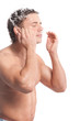 Young man wash face