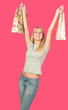 attractive young woman holding shopping bags