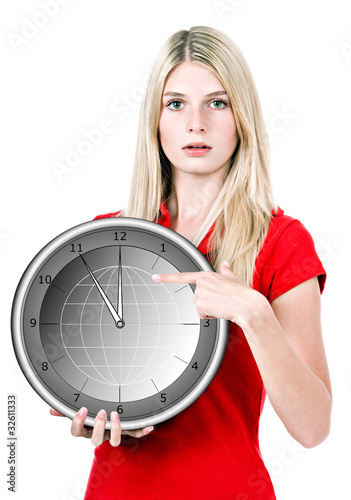 Photo: young beautiful woman with the clock young beautiful woman with the clock